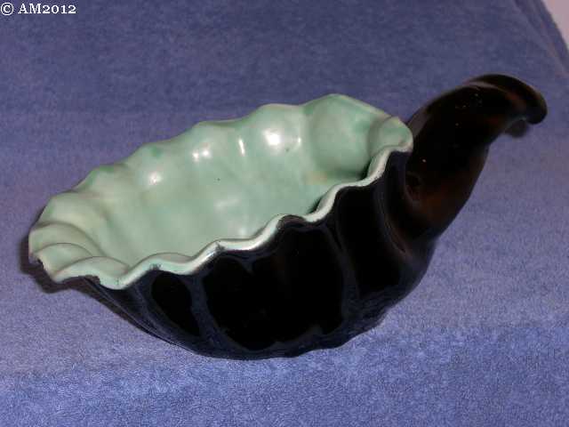 222 medium cornucopia glazed black with jade green interior